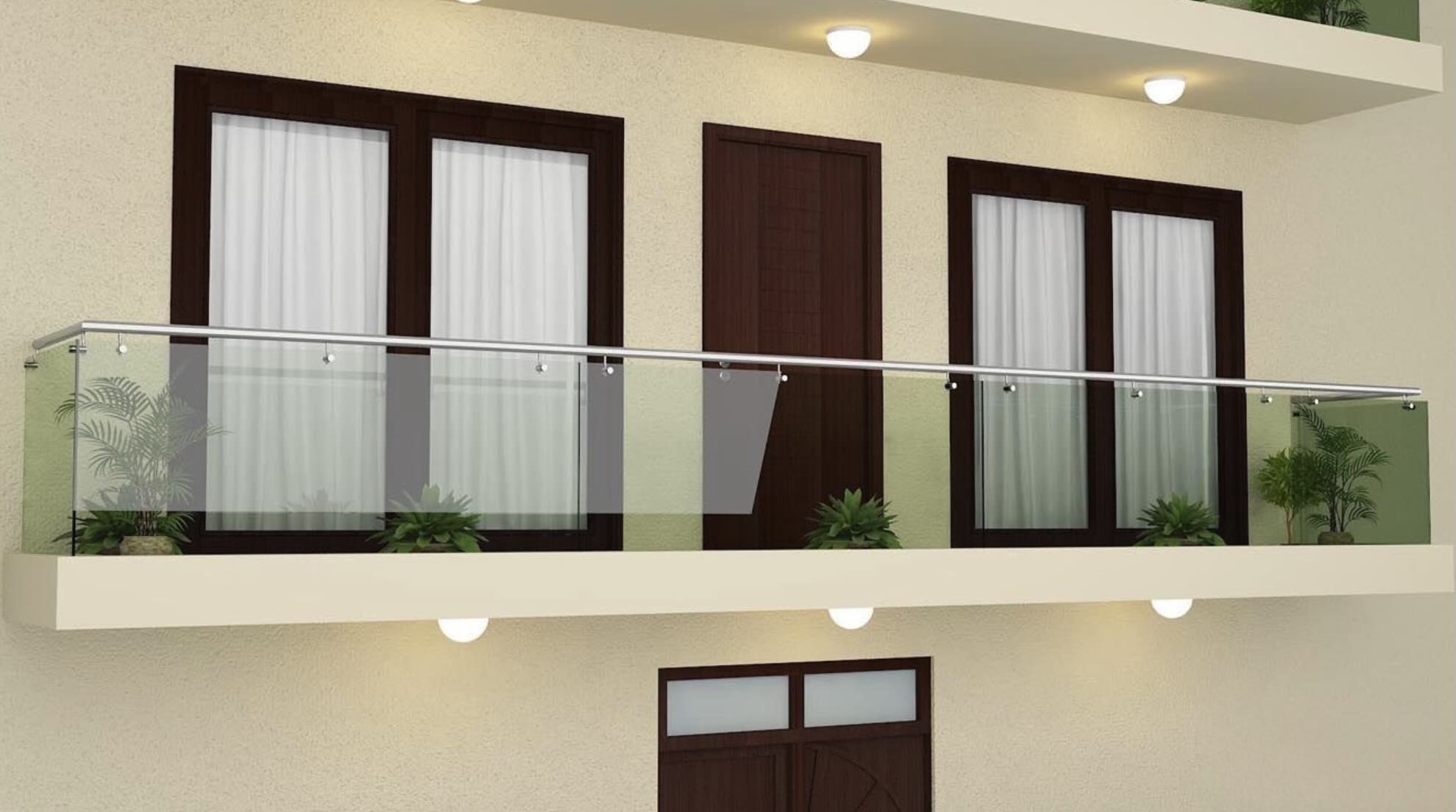 Balconera corrida en fachada residencial